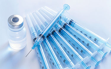 multiple hypodermic needles using silicone lubricants