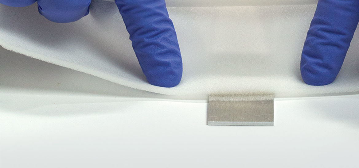 material attached to surface prepared with silicone primer